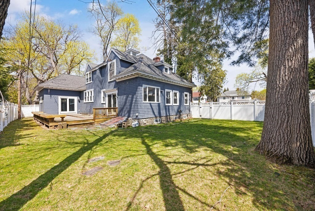 11 Stratford Road Winchester, MA 01890 - Photo 28 of 31 a view of a house with a large pool and a large tree