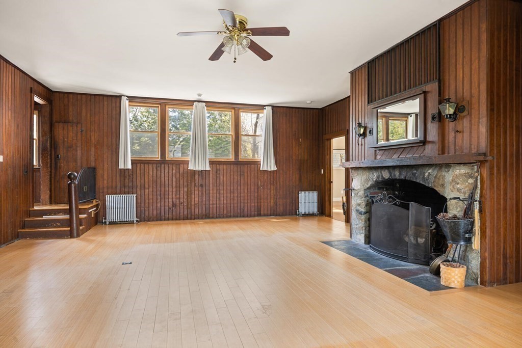 11 Stratford Road Winchester, MA 01890 - Photo 4 of 31 a view of livingroom with furniture and a fireplace