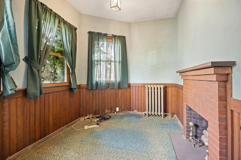 11 Stratford Road Winchester, MA 01890 - Photo 6 of 31 a view of a porch with wooden floor and a window
