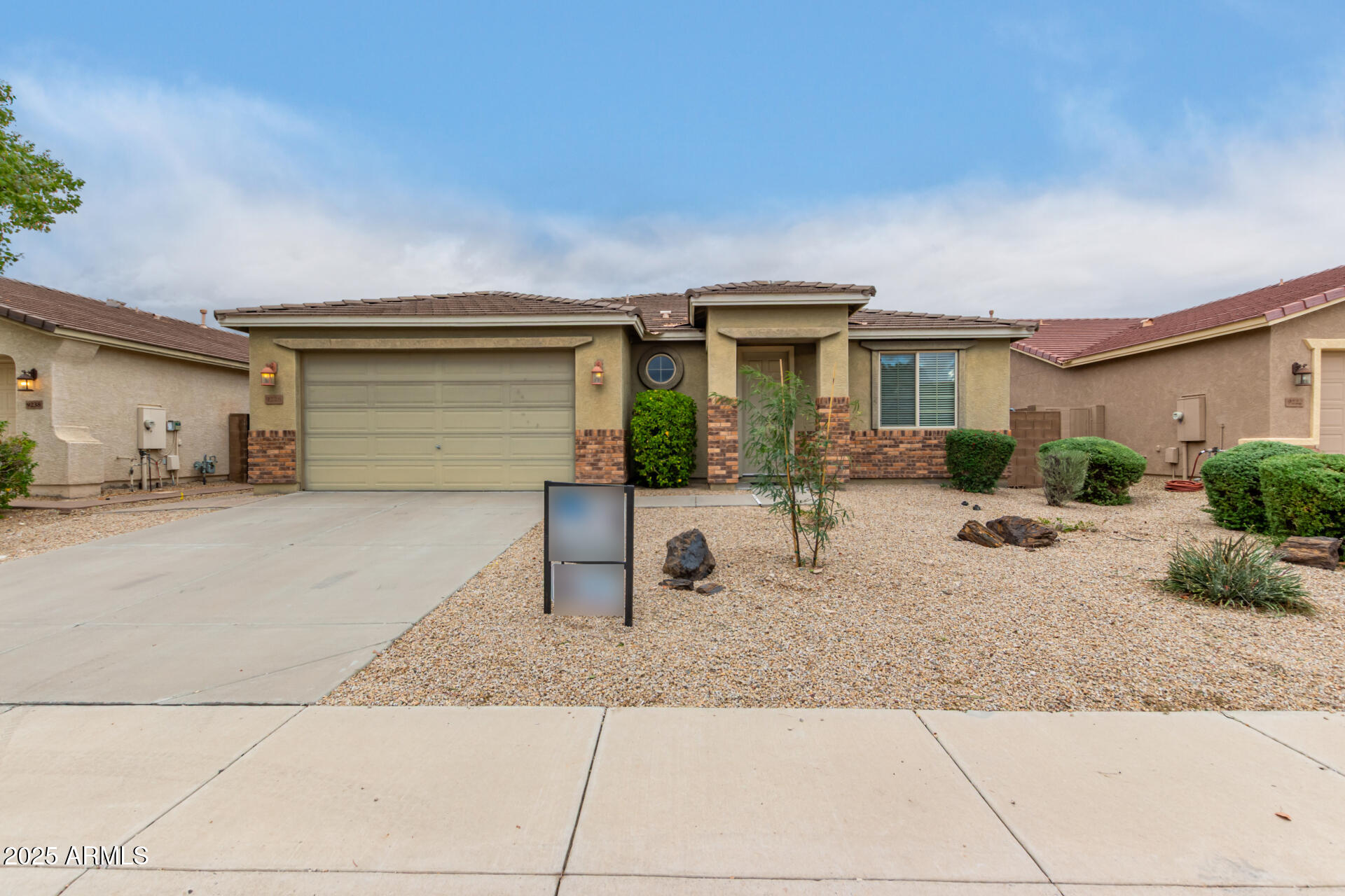 9228 West Black Hill Road Peoria, AZ 85383 - Photo 1 of 44 a front view of a house with porch