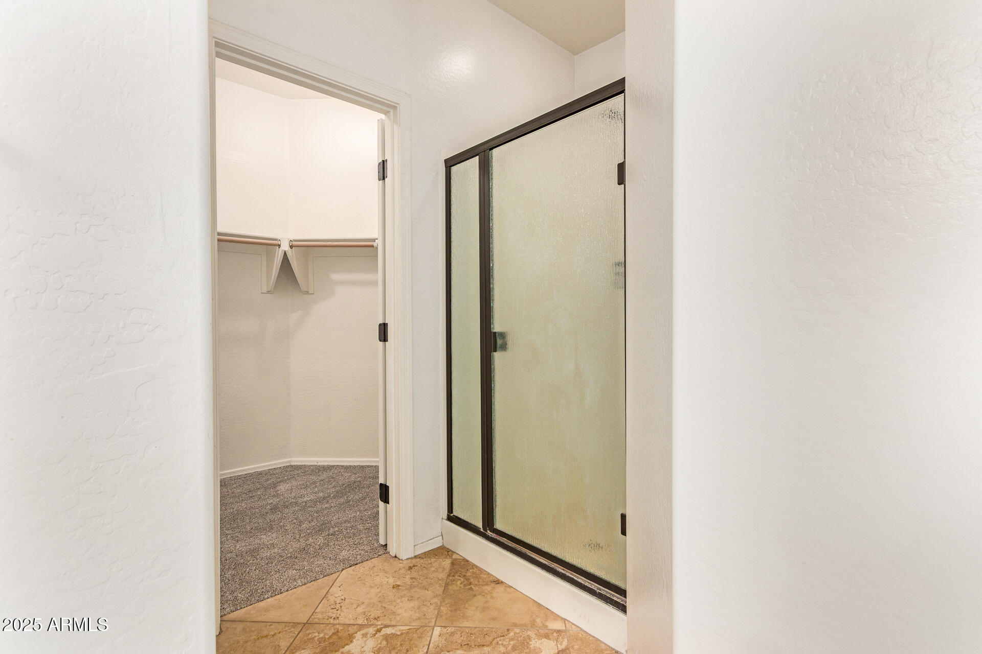 9228 West Black Hill Road Peoria, AZ 85383 - Photo 22 of 44 a view of a bathroom with shower