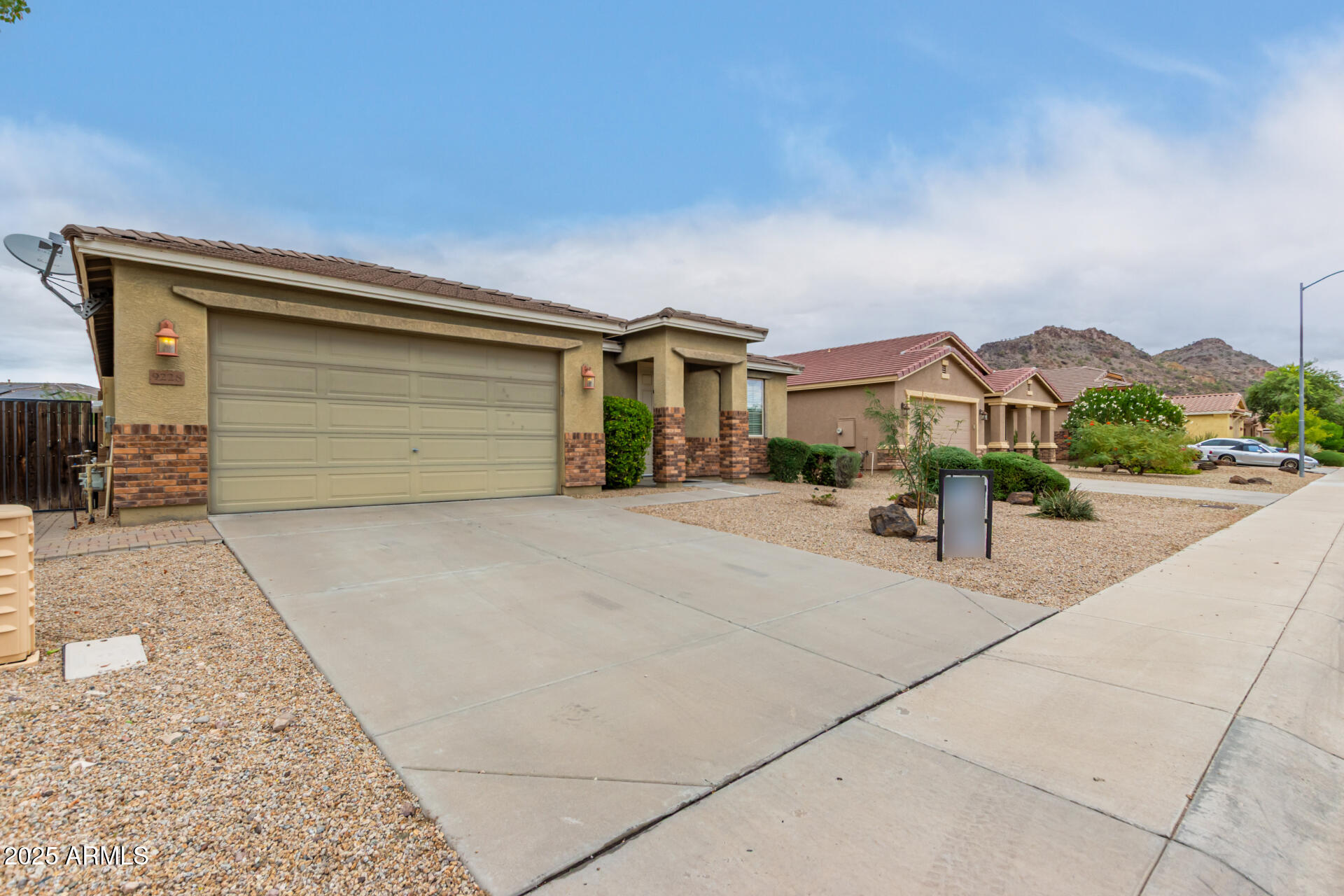 9228 West Black Hill Road Peoria, AZ 85383 - Photo 2 of 44 a house view with a outdoor space