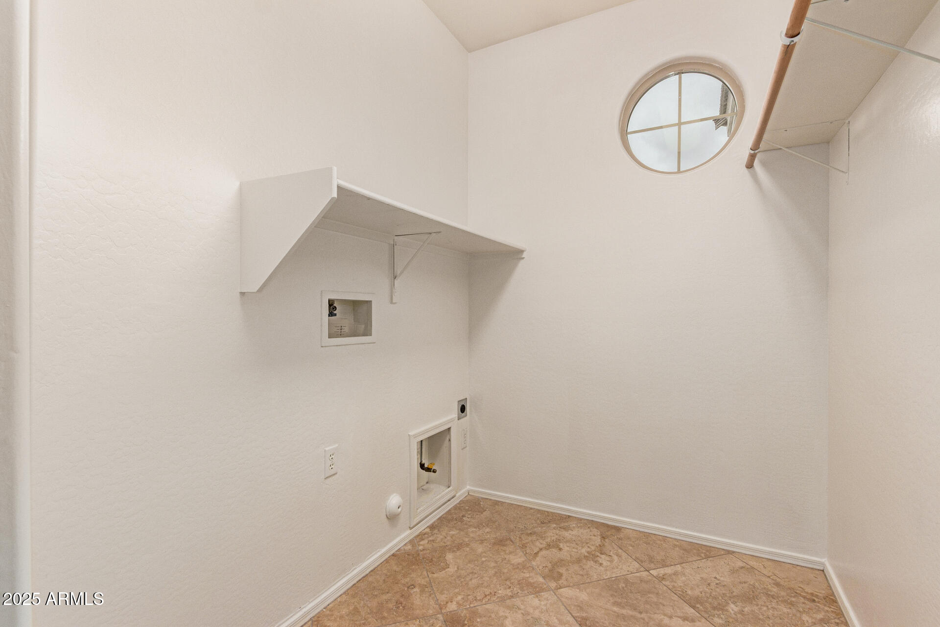 9228 West Black Hill Road Peoria, AZ 85383 - Photo 36 of 44 a view of a storage & utility room with sink