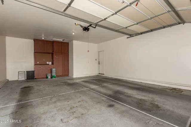 a view of a storage & utility room with sink