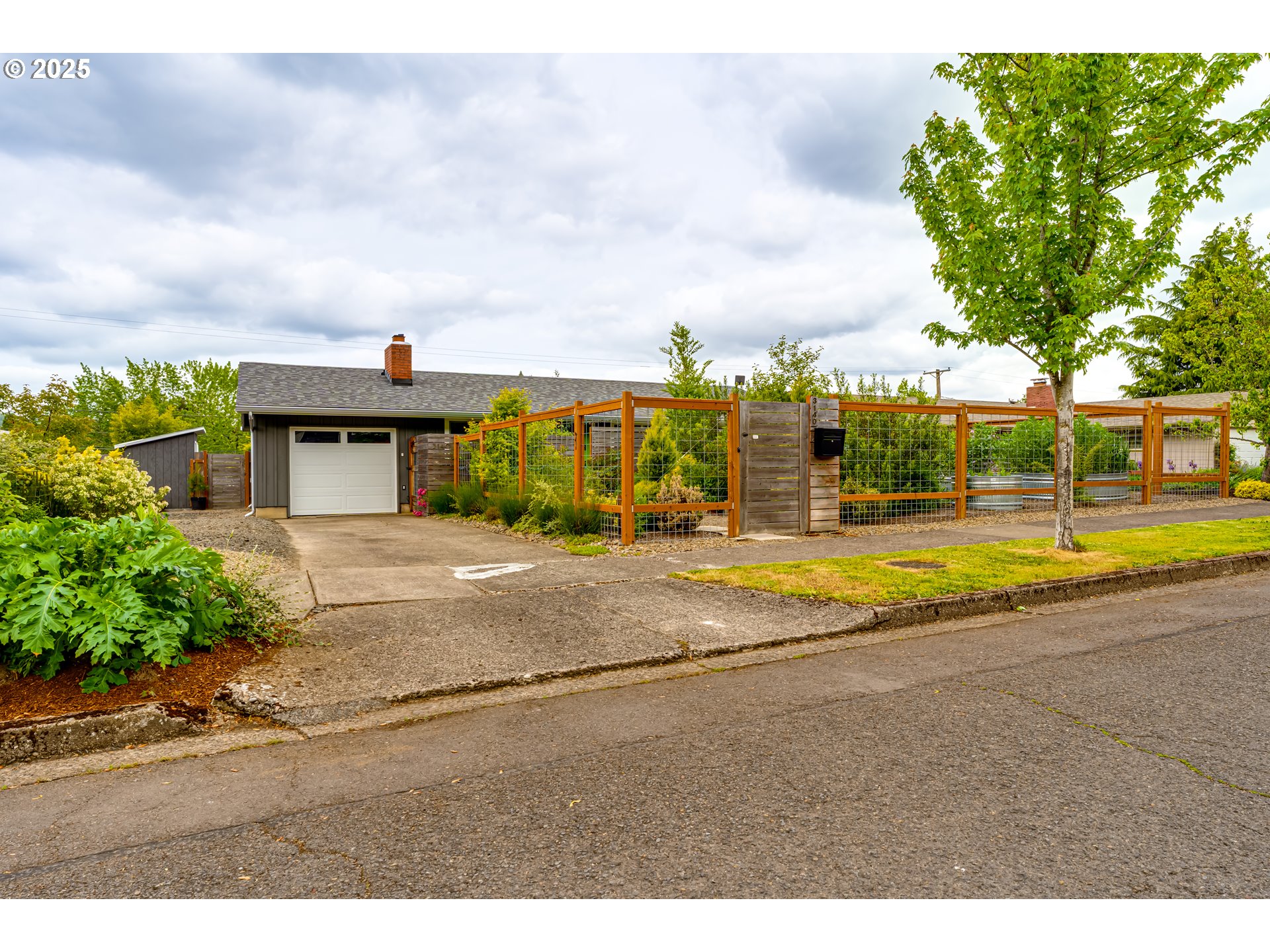 a view of swimming pool in front of residential houses