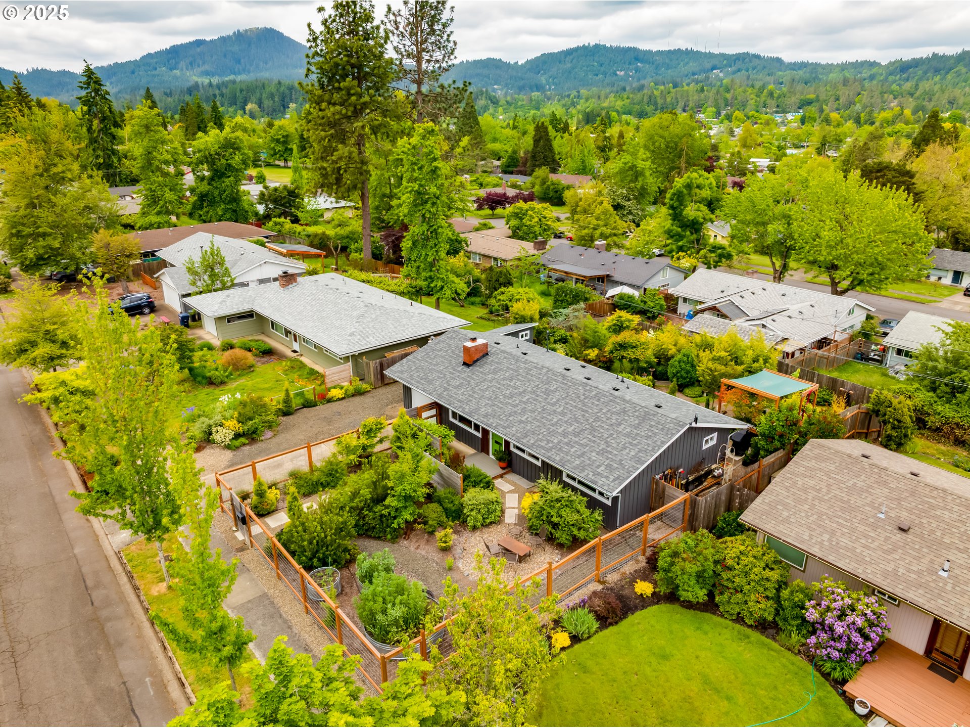 3140 Onyx Street Eugene, OR 97405 - Photo 30 of 32 an aerial view of residential houses with outdoor space