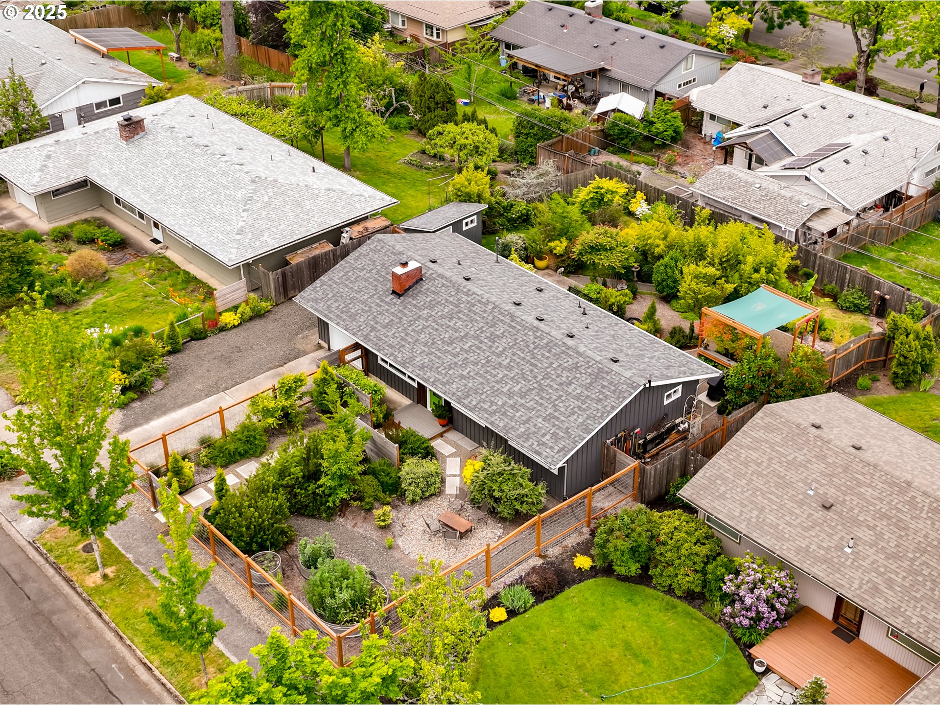 3140 Onyx Street Eugene, OR 97405 - Photo 31 of 32 an aerial view of a house with a garden and plants