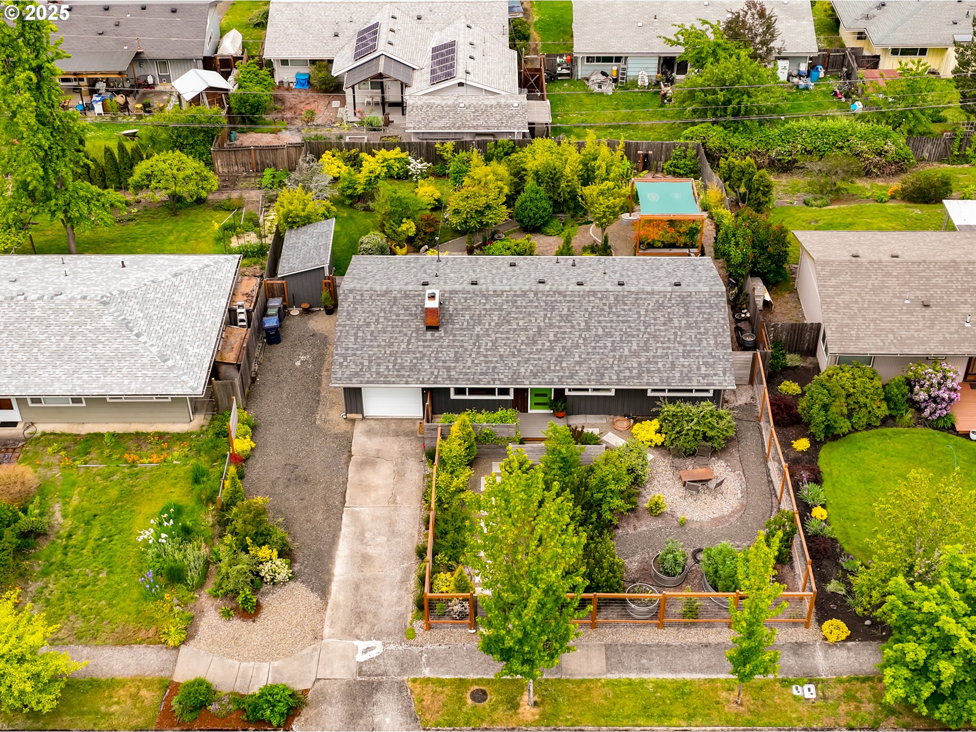 3140 Onyx Street Eugene, OR 97405 - Photo 32 of 32 an aerial view of a house with a yard basket ball court and outdoor seating