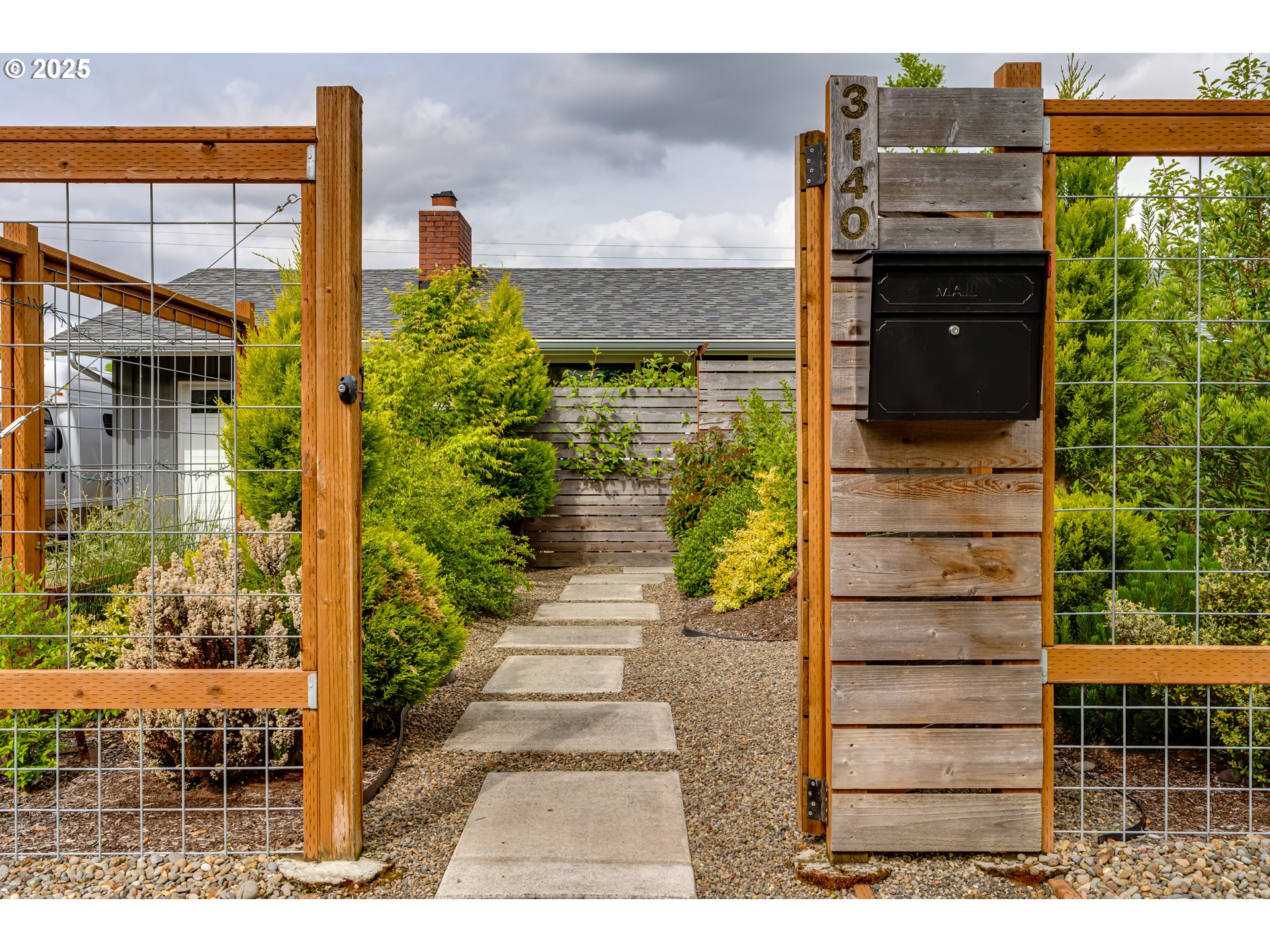 3140 Onyx Street Eugene, OR 97405 - Photo 5 of 32 a view of a pathway both side of building