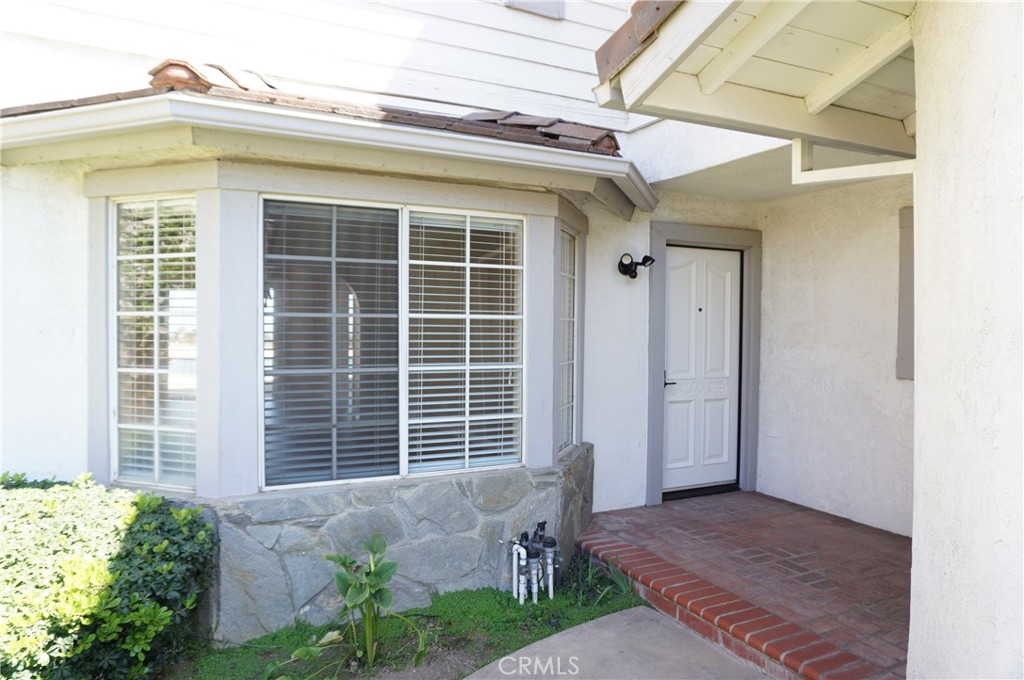 19584 Shadow Glen Circle Porter Ranch, CA 91326 - Photo 3 of 72 a front view of a house with a yard