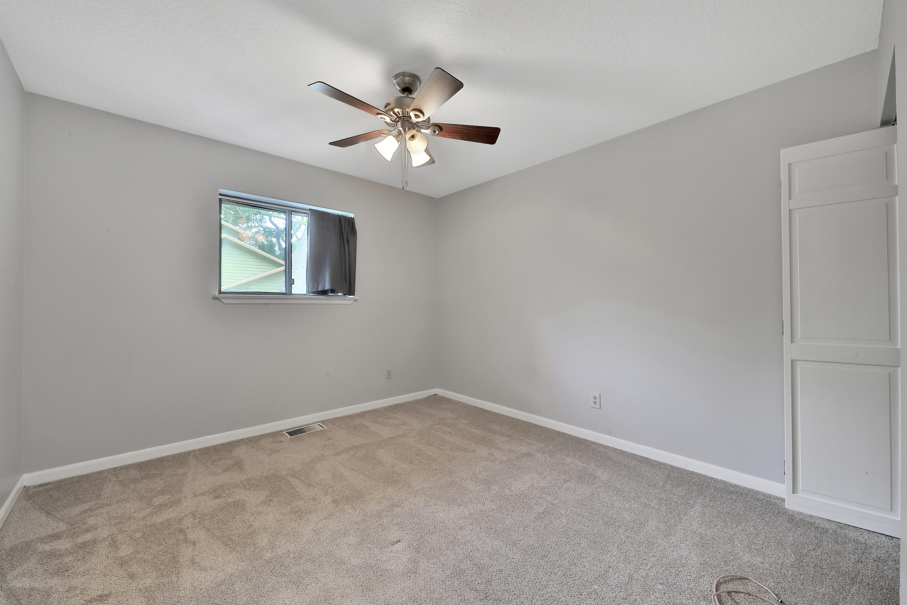 1350 Pinewood Road Jacksonville Beach, FL 32250 - Photo 20 of 45 a view of empty room with window