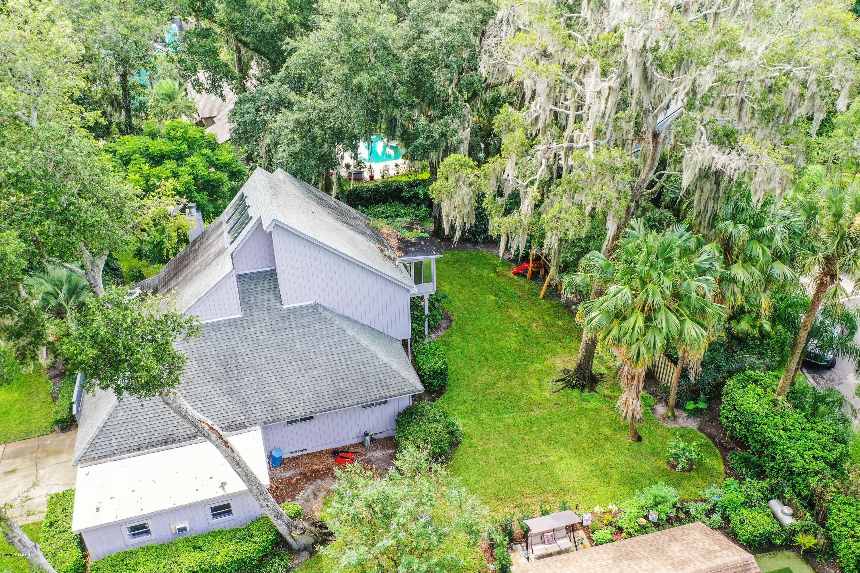 1350 Pinewood Road Jacksonville Beach, FL 32250 - Photo 44 of 45 a aerial view of house with yard