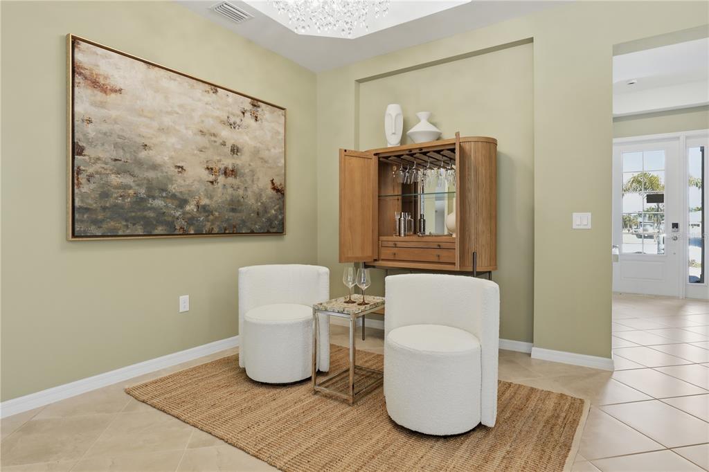7153 Inlet Isles Lakewood Ranch, FL 34202 - Photo 2 of 26 a living room with couch and a table