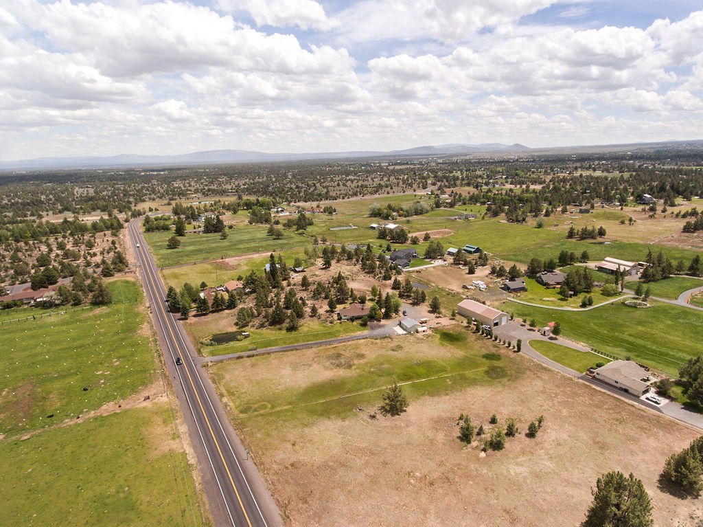 61395 Ward Road Bend, OR 97702 - Photo 46 of 56 an aerial view of ocean boats and trees