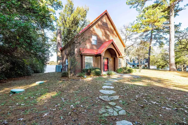a view of swimming pool with an outdoor space and seating area