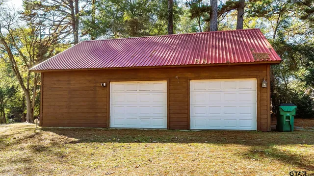 a view of a room with wooden walls