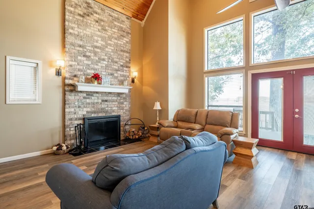 a kitchen with a sink and a large window