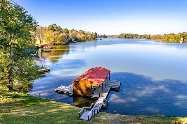 a view of large house with a yard