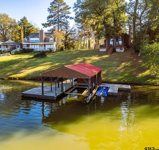 a view of a chair and table on the wooden floor