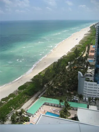 a view of a street with a houses