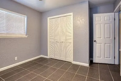 an empty room with windows