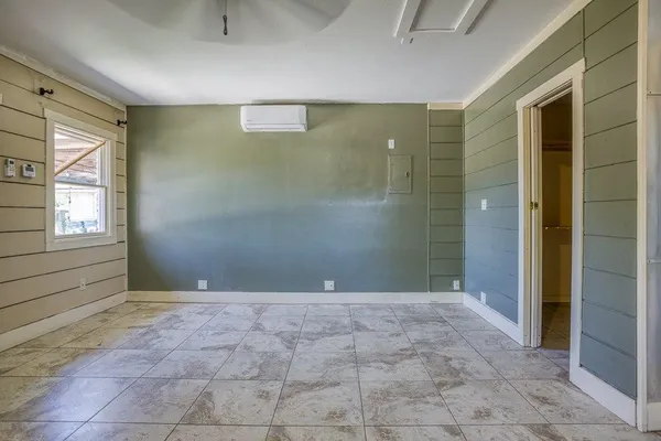 a bathroom with a shower and a toilet