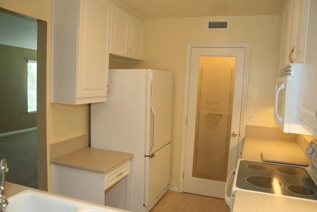 2118 Ridgeview Place Escondido, CA 92026 - Photo 11 of 25 Please note the fun "Pantry" etched glass door. Refrigerator is included with this sale.