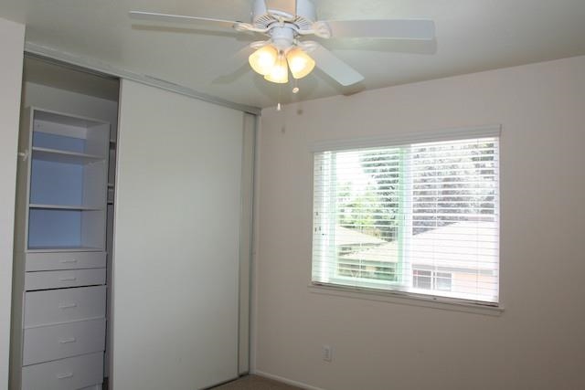 2118 Ridgeview Place Escondido, CA 92026 - Photo 15 of 25 One of the bedrooms upstairs. Please note the built-ins in the closet. All of the bedrooms have ceiling fans, a nice feature.