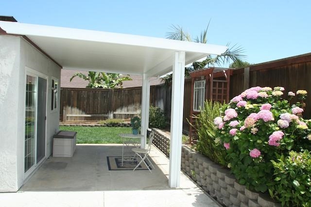2118 Ridgeview Place Escondido, CA 92026 - Photo 19 of 25 Covered patio with raised planters. Backyard is fenced and gated. The grassy area and raised planter extends to the north about another 30 feet.