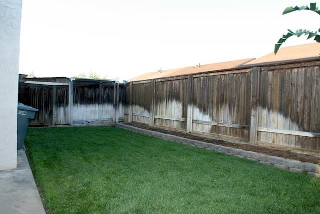 2118 Ridgeview Place Escondido, CA 92026 - Photo 25 of 25 Private backyard -- enjoy the coolness of the grass, plant a small garden in the raised planter or a great place for the family pet.