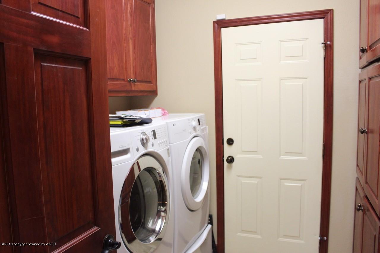 7414 Bayswater Road Amarillo, TX 79119 - Photo 15 of 19 spacious laundry room and garage access