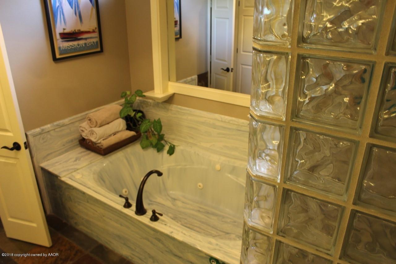 7414 Bayswater Road Amarillo, TX 79119 - Photo 10 of 19 jetted oversized tub in master bath