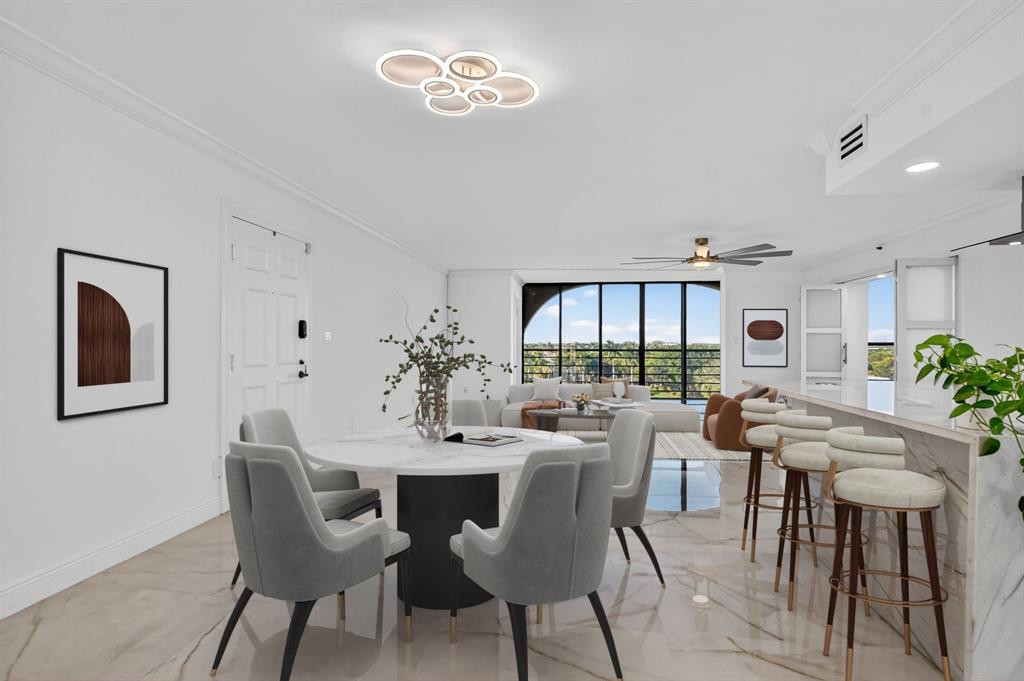 7145 Promenade Drive, Unit C702 Boca Raton, FL 33433 - Photo 17 of 82 a view of a dining room with furniture and window