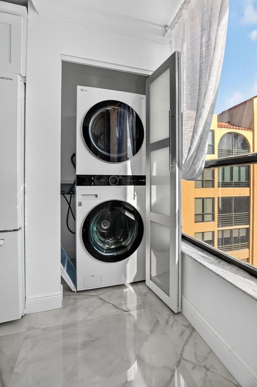 7145 Promenade Drive, Unit C702 Boca Raton, FL 33433 - Photo 33 of 82 a view of a hallway with washer and dryer