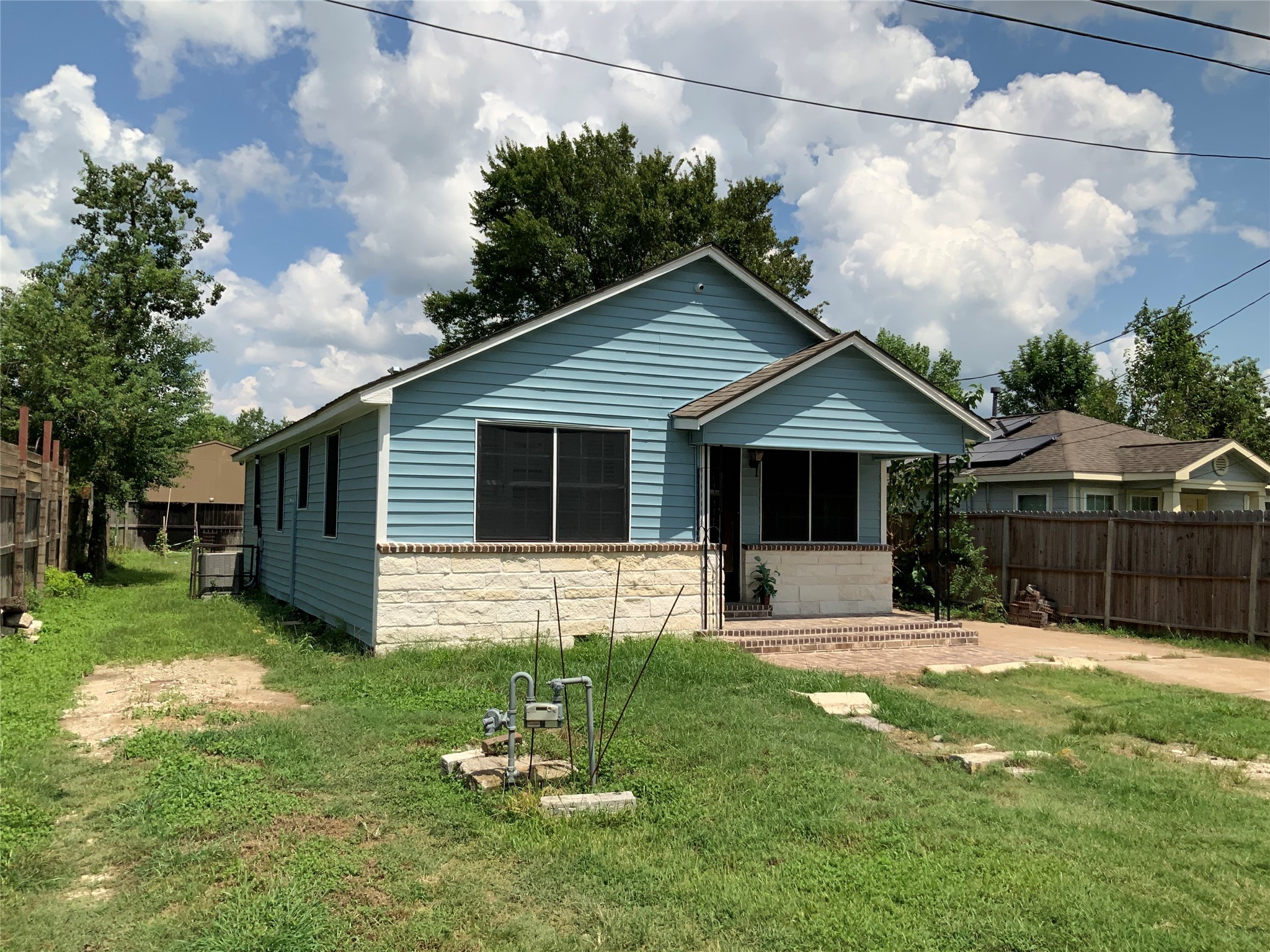 2415 Perry Street Baytown, TX 77521 - Photo 11 of 28 a front view of house with a garden