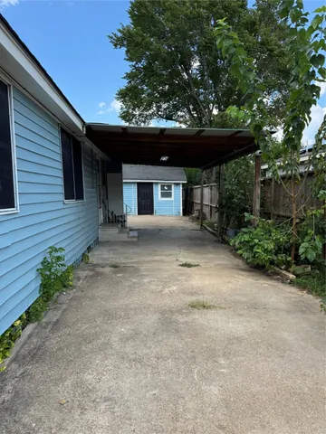 a view of a house with a garage