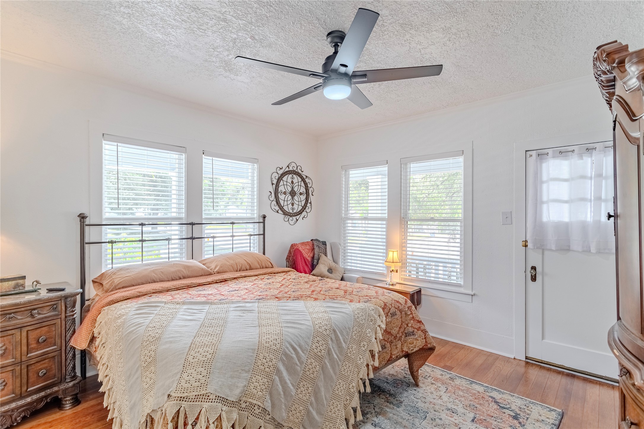 1707 South Day Street Brenham, TX 77833 - Photo 12 of 23 a bedroom with a large bed and a window