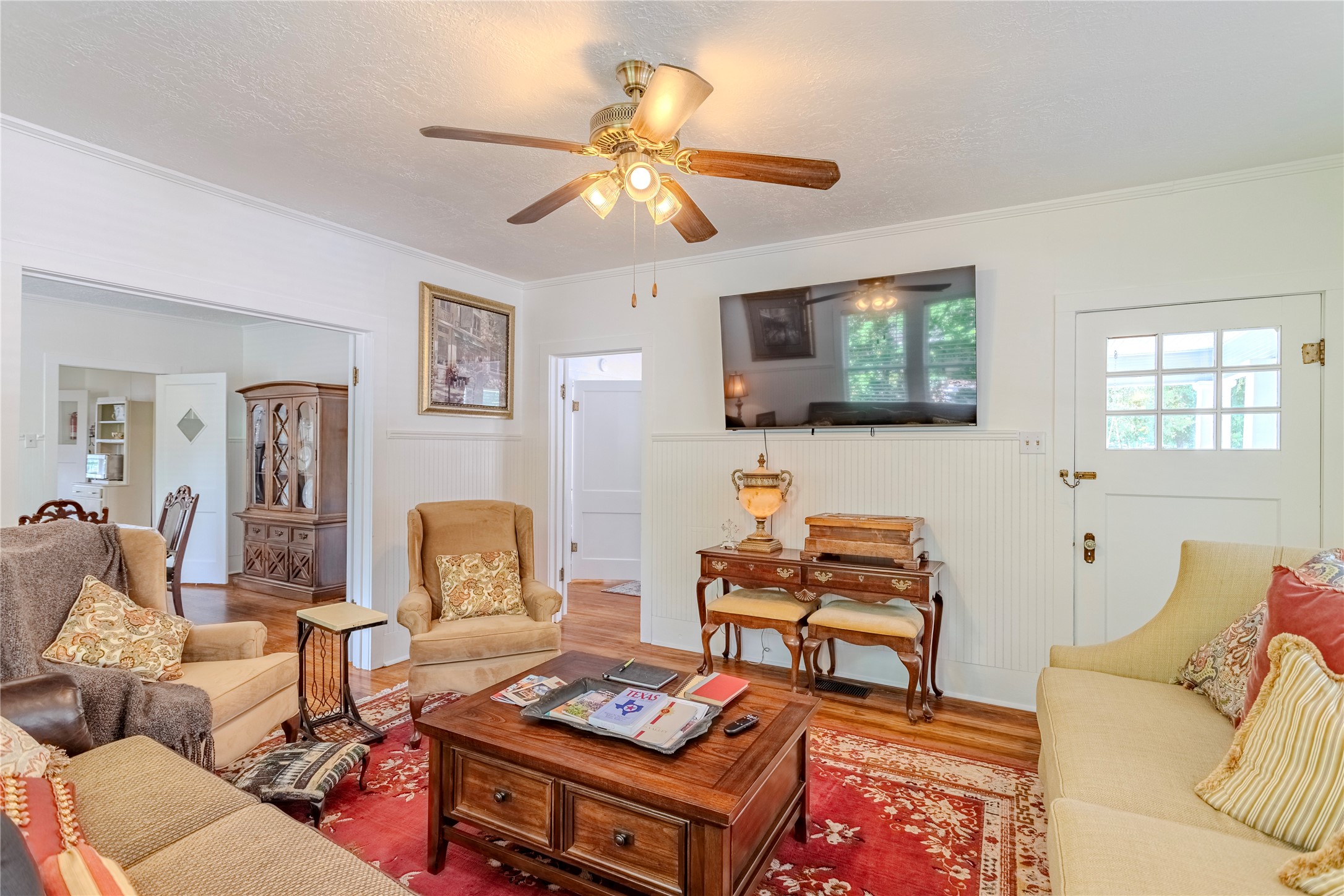 1707 South Day Street Brenham, TX 77833 - Photo 15 of 23 a living room with furniture and a flat screen tv