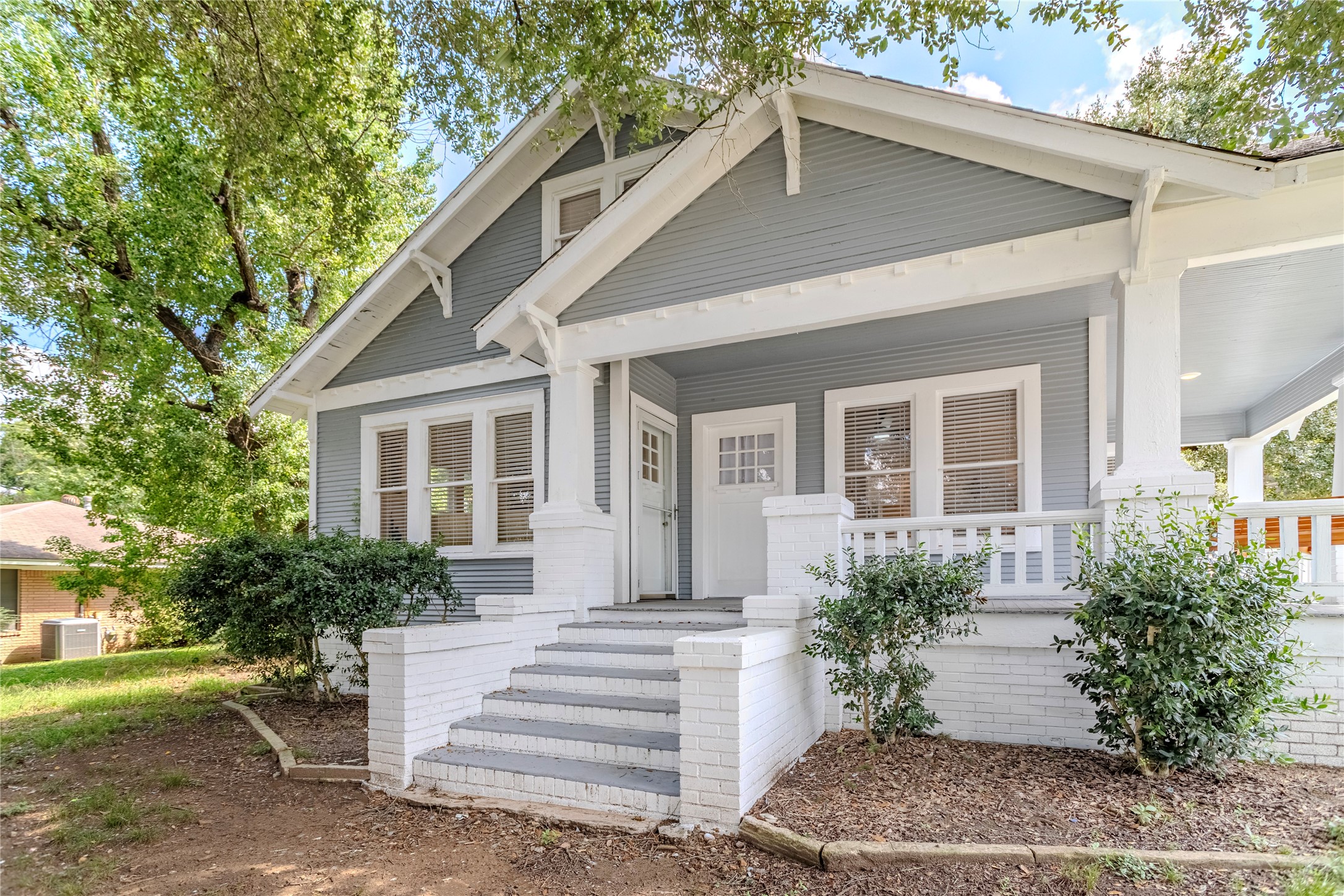 1707 South Day Street Brenham, TX 77833 - Photo 2 of 23 a front view of a house with a yard