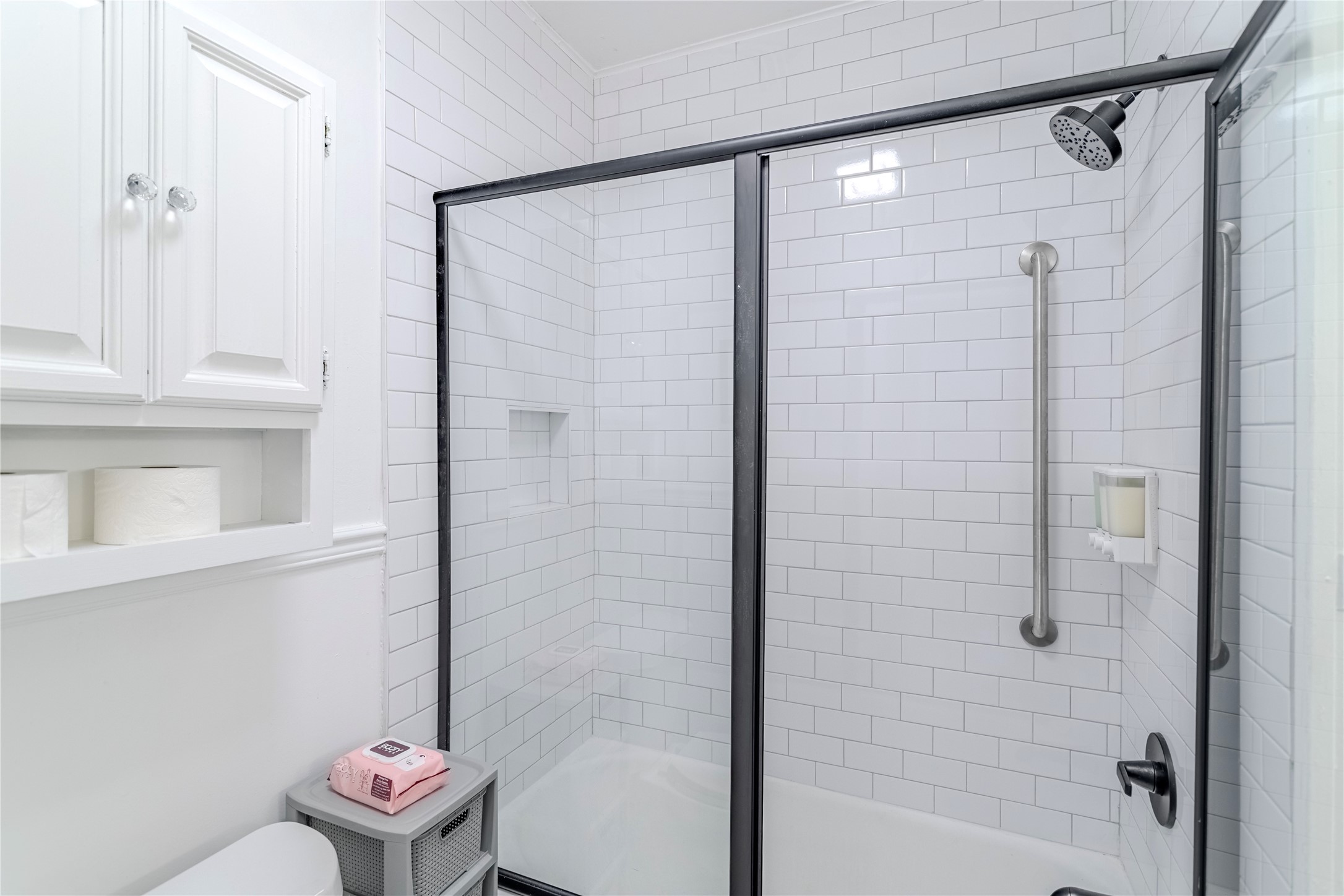 1707 South Day Street Brenham, TX 77833 - Photo 9 of 23 a bathroom with a shower and a toilet