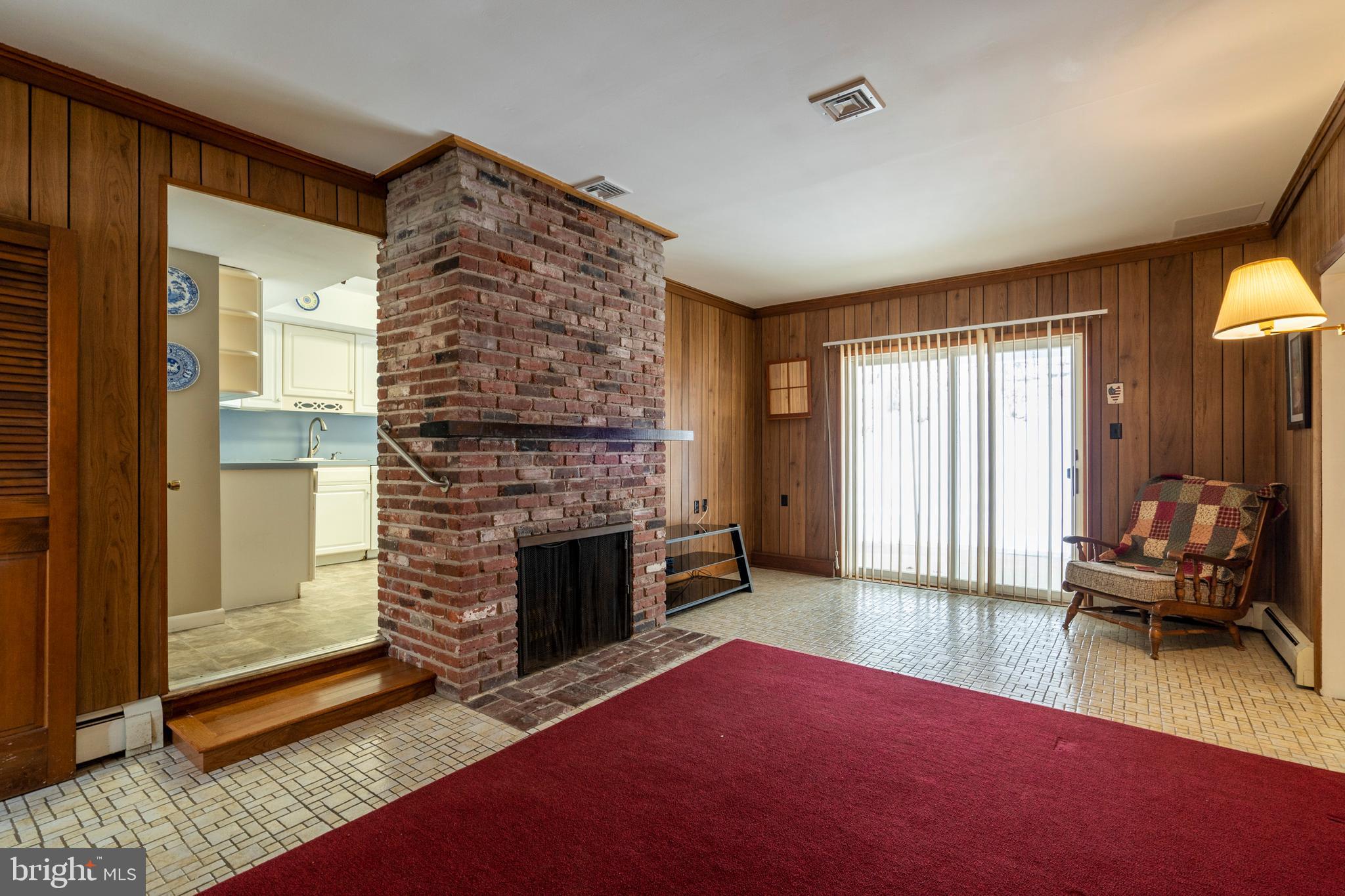 324 Bodine Road Berwyn, PA 19312 - Photo 7 of 36 Family room w/ fireplace off of kitchen