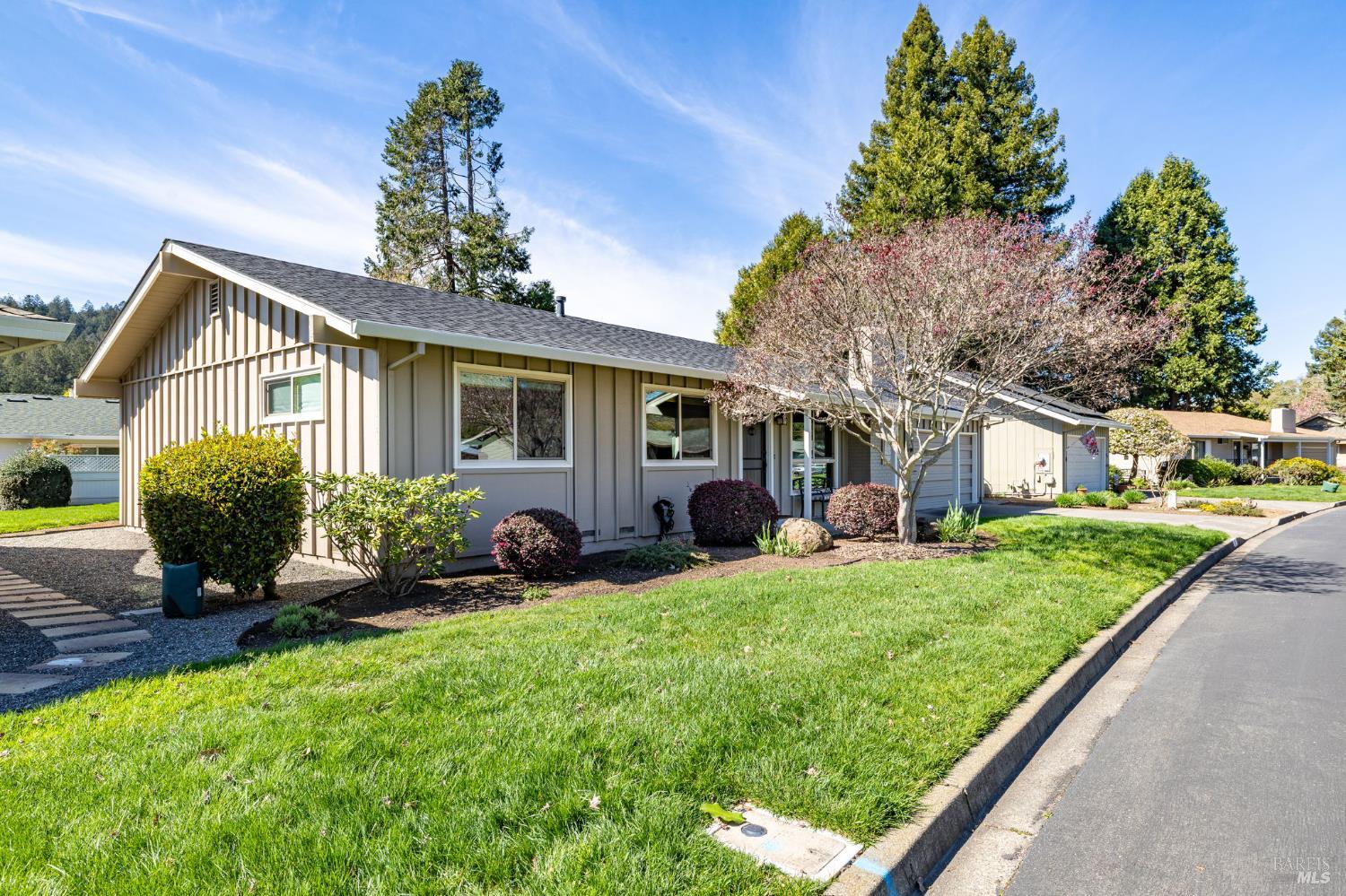 96 Aspen Meadows Circle Santa Rosa, CA 95409 - Photo 2 of 46 a front view of a house with a yard and garage