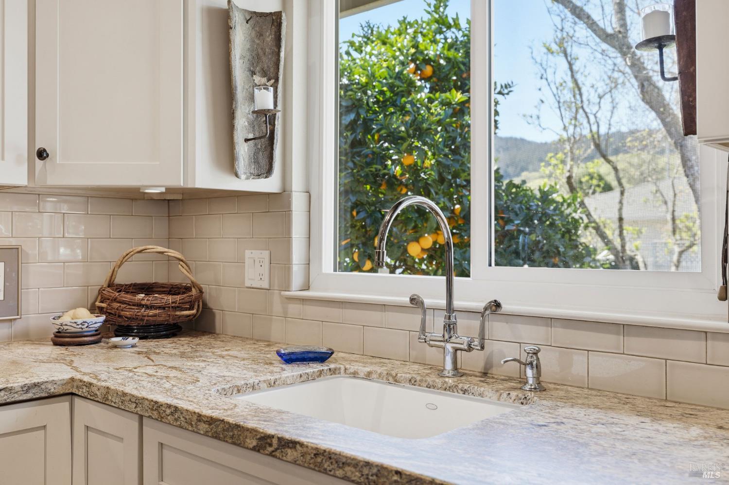 96 Aspen Meadows Circle Santa Rosa, CA 95409 - Photo 21 of 46 a kitchen with a sink and cabinets