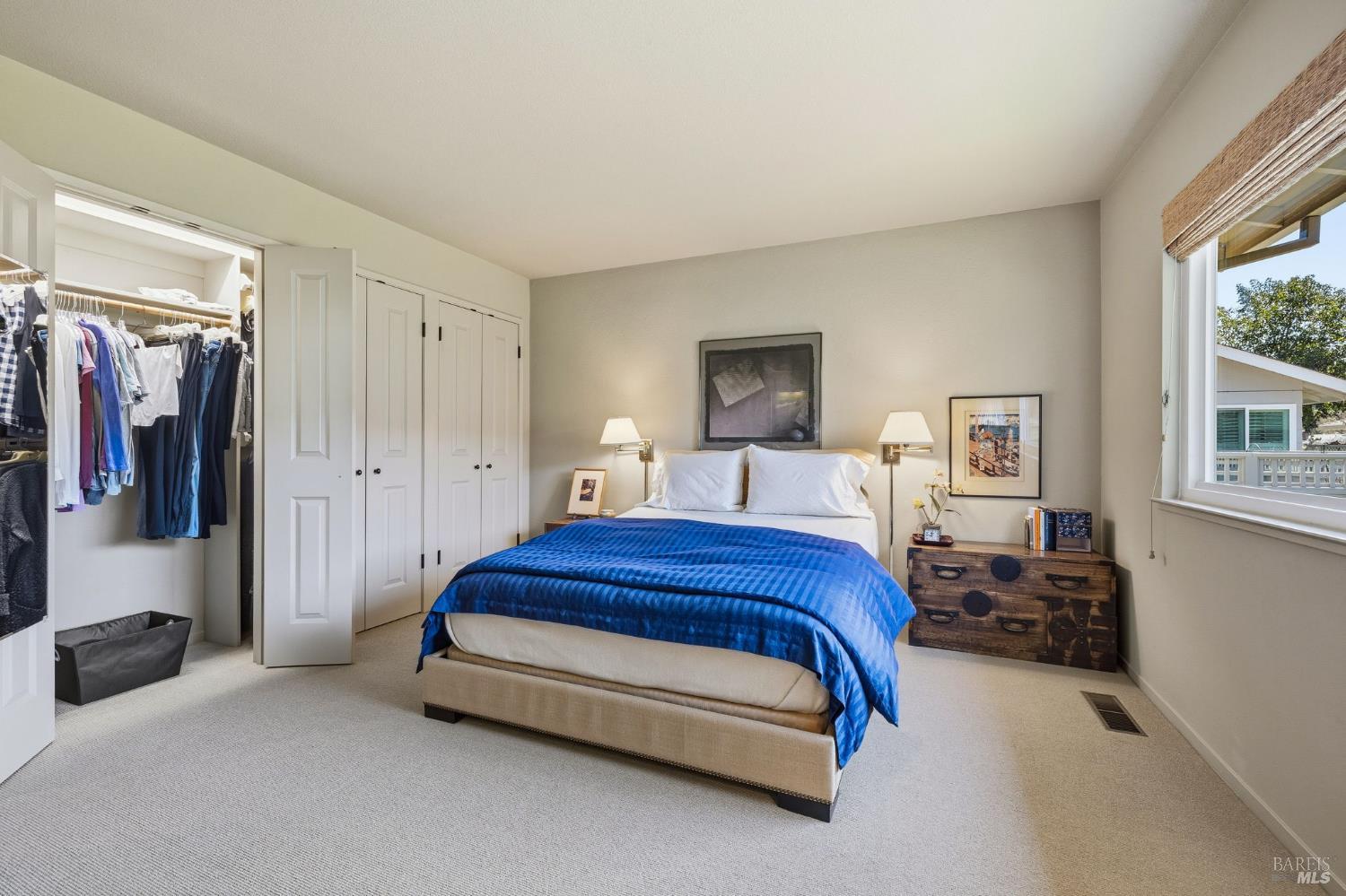 96 Aspen Meadows Circle Santa Rosa, CA 95409 - Photo 26 of 46 a spacious bedroom with a bed and a couch