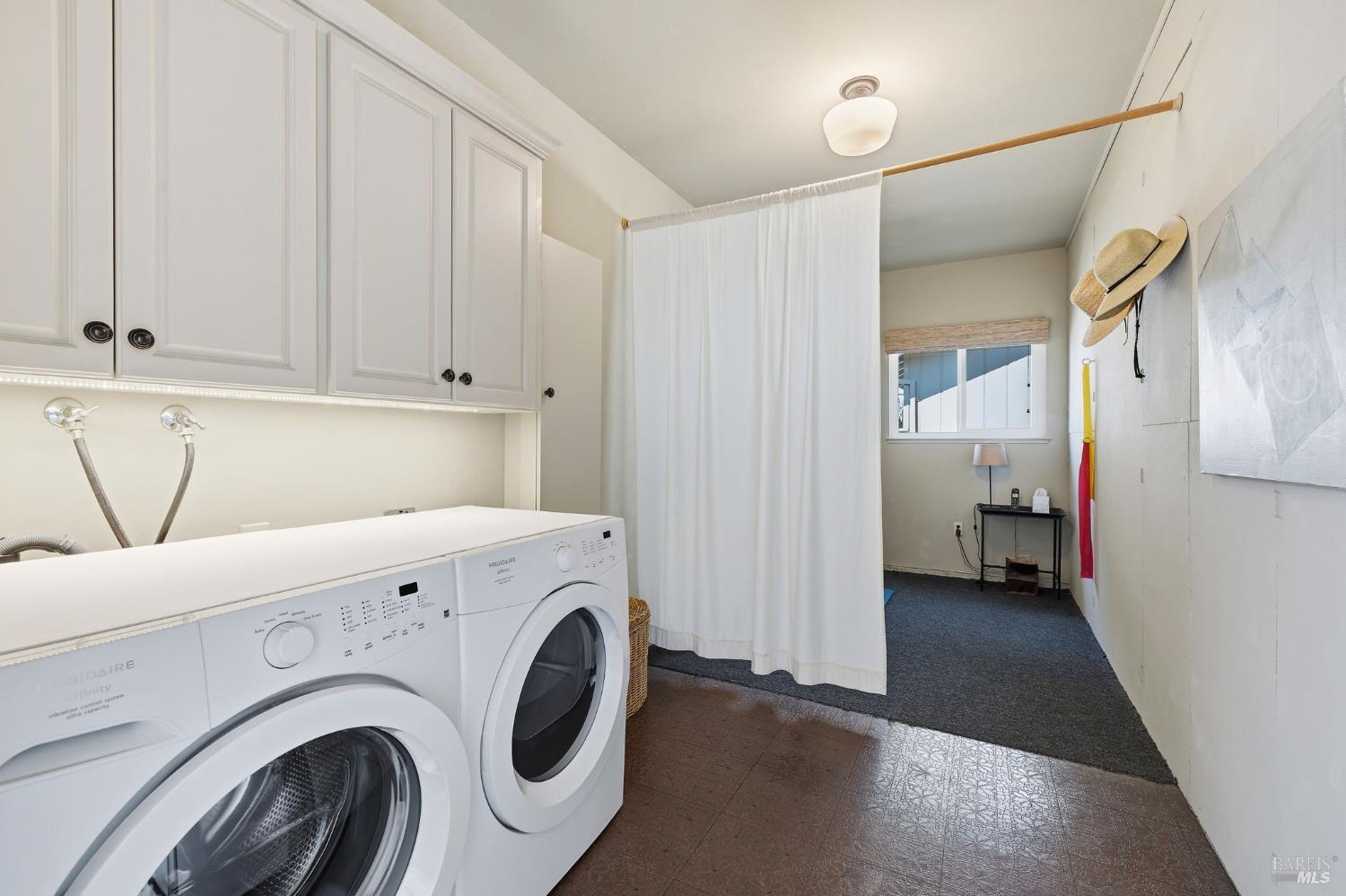 96 Aspen Meadows Circle Santa Rosa, CA 95409 - Photo 30 of 46 a view of storage and utility room with washer and dryer