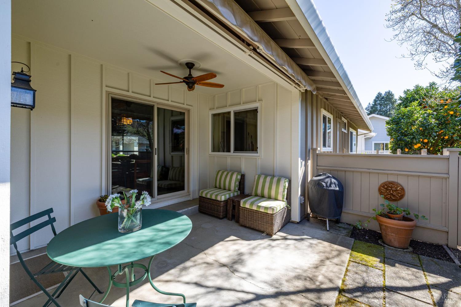 96 Aspen Meadows Circle Santa Rosa, CA 95409 - Photo 34 of 46 a backyard of a house with fire pit table and chairs