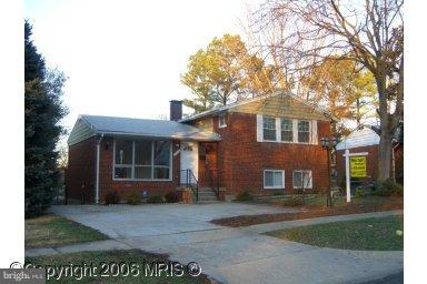 13021 Matey Road Silver Spring, MD 20906 - Photo 1 of 27 a front view of a house with a garden