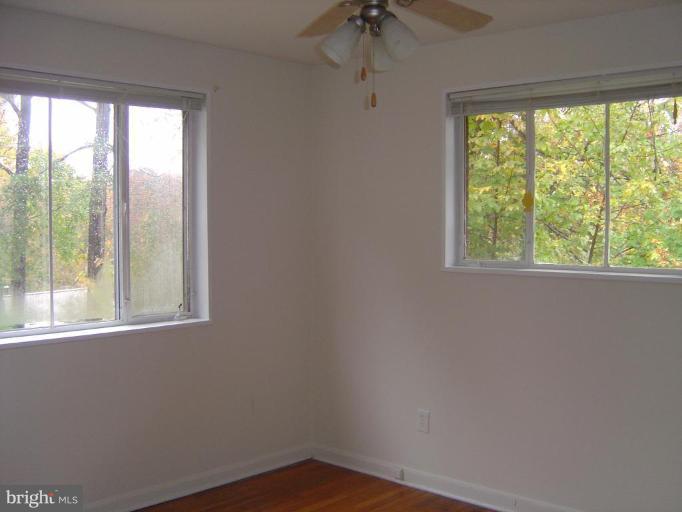13021 Matey Road Silver Spring, MD 20906 - Photo 11 of 27 an empty room with a window