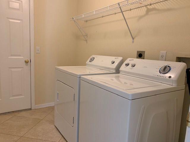 1557 Southwest Fortune Road Port St. Lucie, FL 34953 - Photo 23 of 29 LAUNDRY ROOM