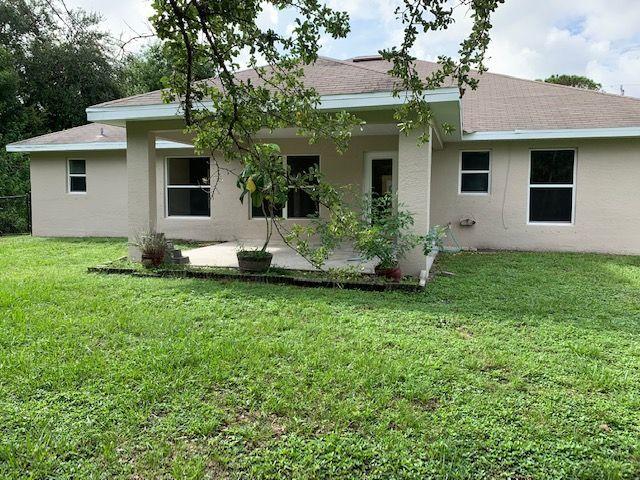 1557 Southwest Fortune Road Port St. Lucie, FL 34953 - Photo 26 of 29 LARGE COVERED PATIO